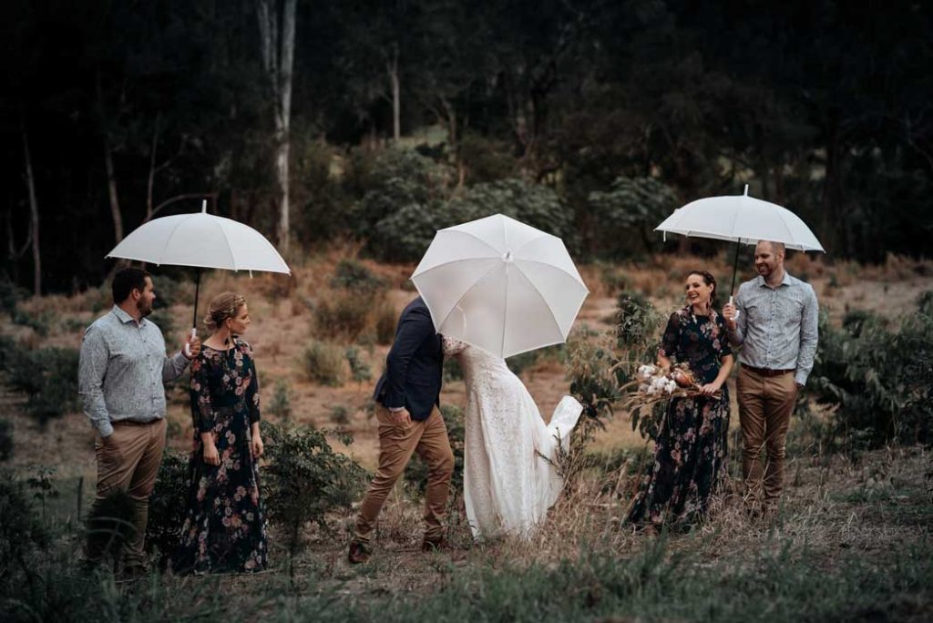 wet weather wedding portraits, umbrella